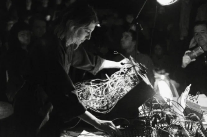 Black and white photo of Haffar using a synth